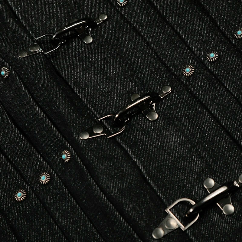 Latch Buckle Denim Jacket detail with metal clasp fastenings, turquoise-colour studs and dark denim texture