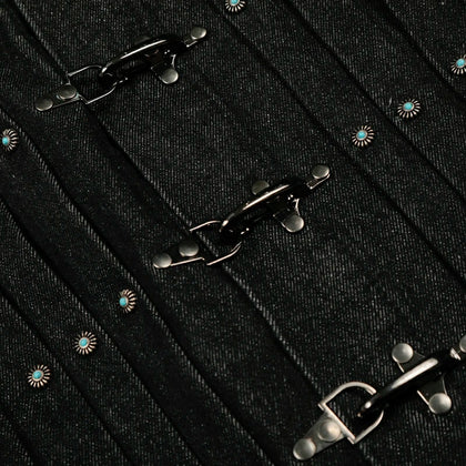 Latch Buckle Denim Jacket detail with metal clasp fastenings, turquoise-colour studs and dark denim texture