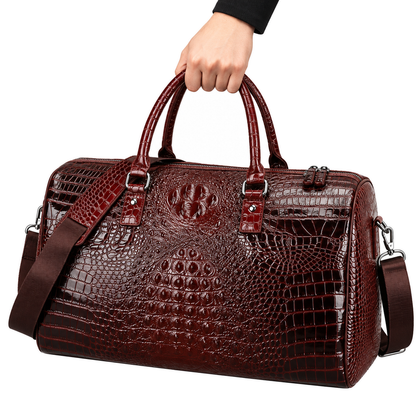 Caiman Relief Weekender — brown hand-held view