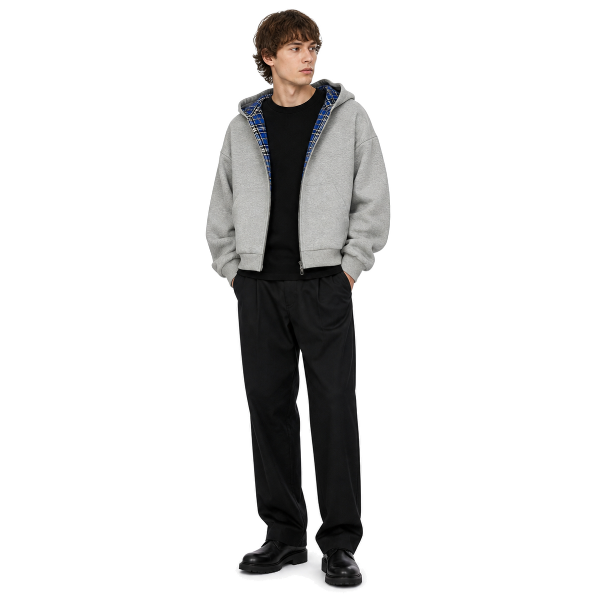 Model wearing the Counterform Cobalt Reversible Hoodie on a white studio background