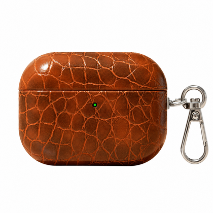 Folio Croc AirPods Case — Cognac / Irregular Emboss, front view
