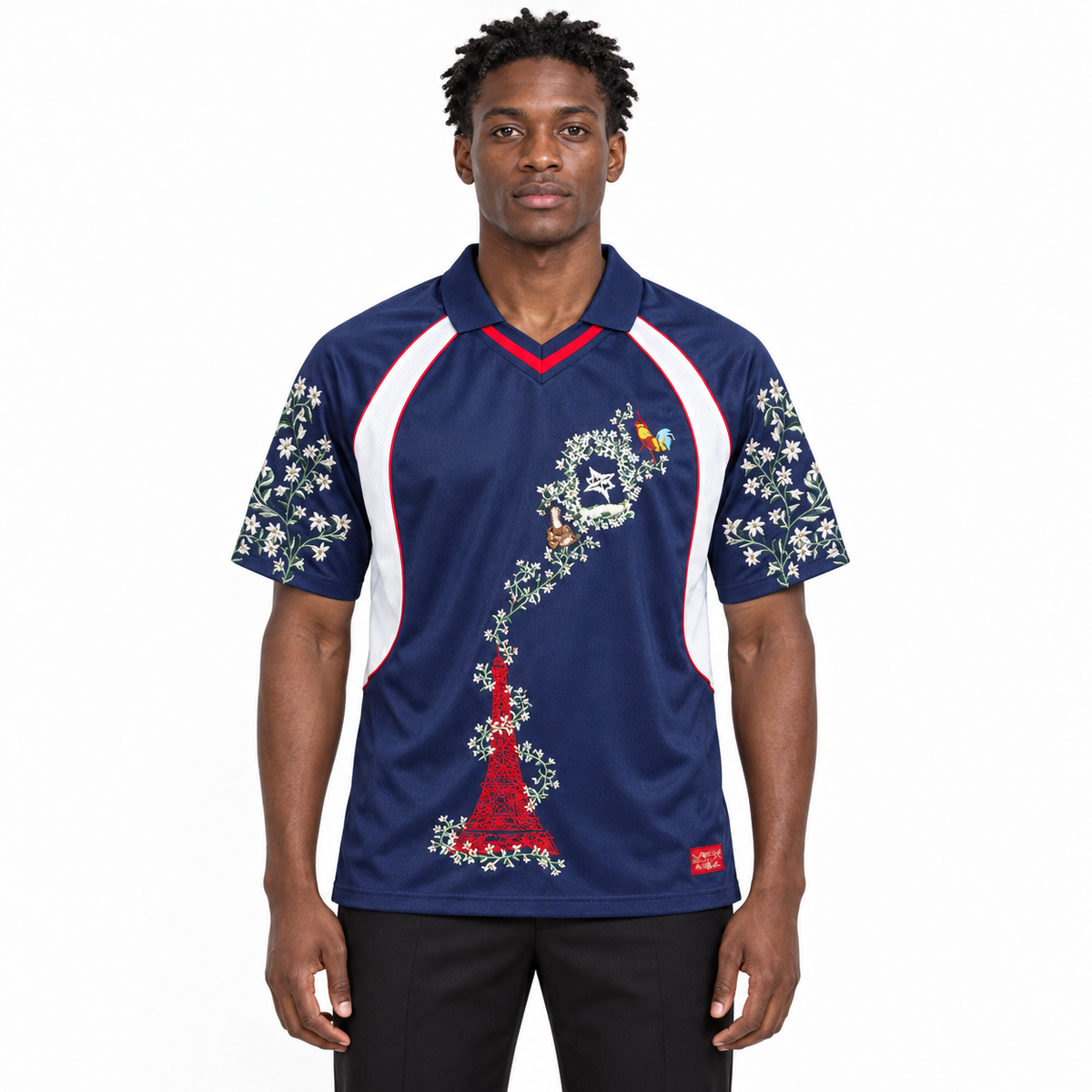 Front-facing model wearing the France navy-and-white embroidered jersey