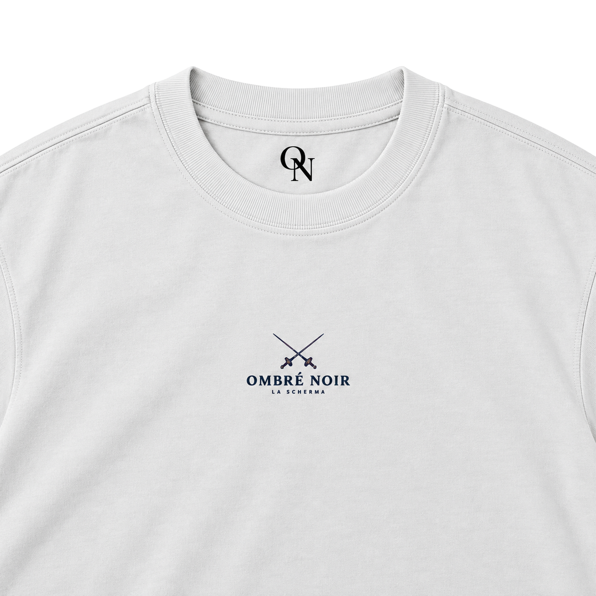La Scherma Lunar Rock tee detail: collar, inner-neck mark and crossed-foil chest print