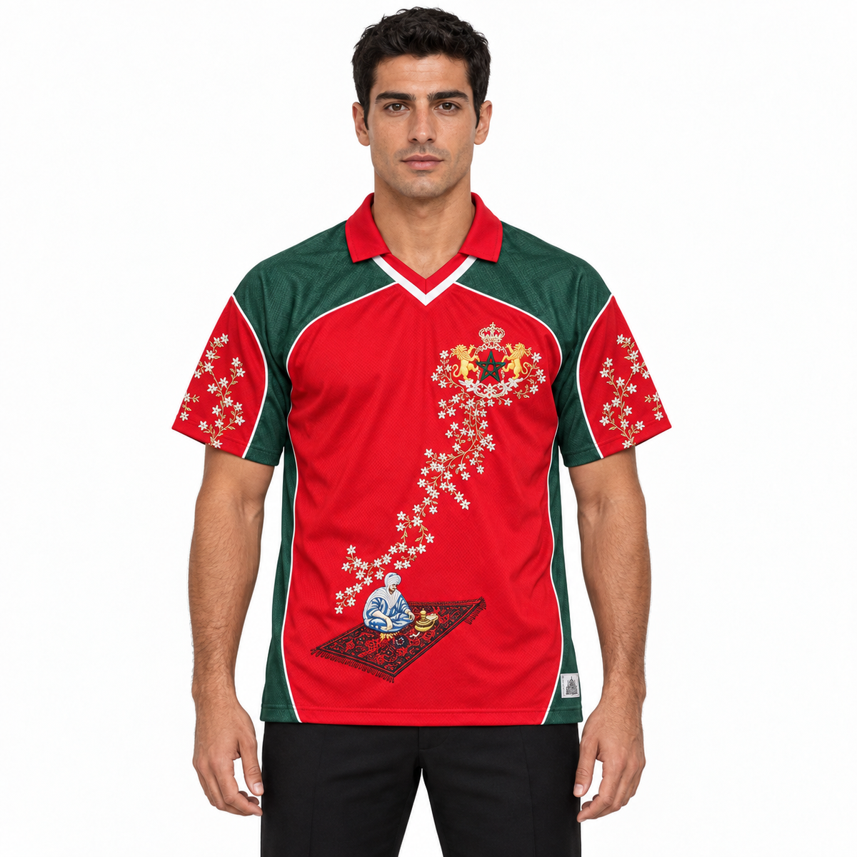 Front-facing model wearing the Morocco red-and-green embroidered jersey