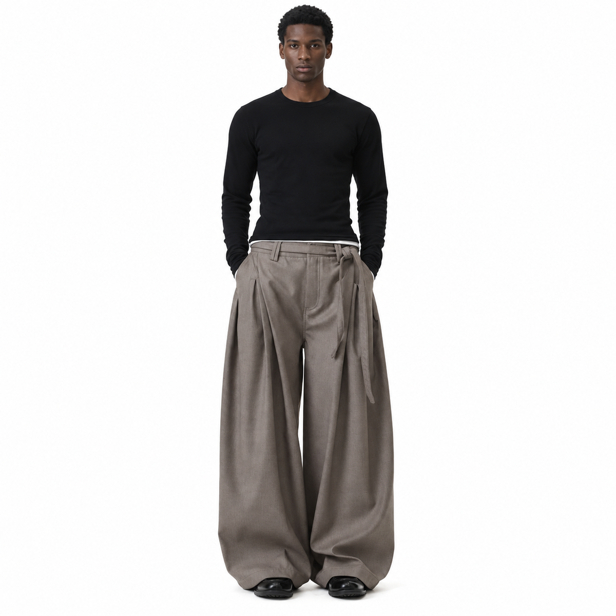 Arc Wide-Leg Pleated Trousers — model