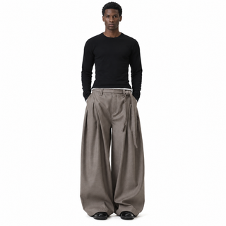 Arc Wide-Leg Pleated Trousers — model
