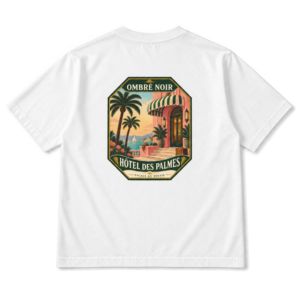 Hôtel des Palmes Graphic Tee in White, back view with palm-lined seaside hotel illustration