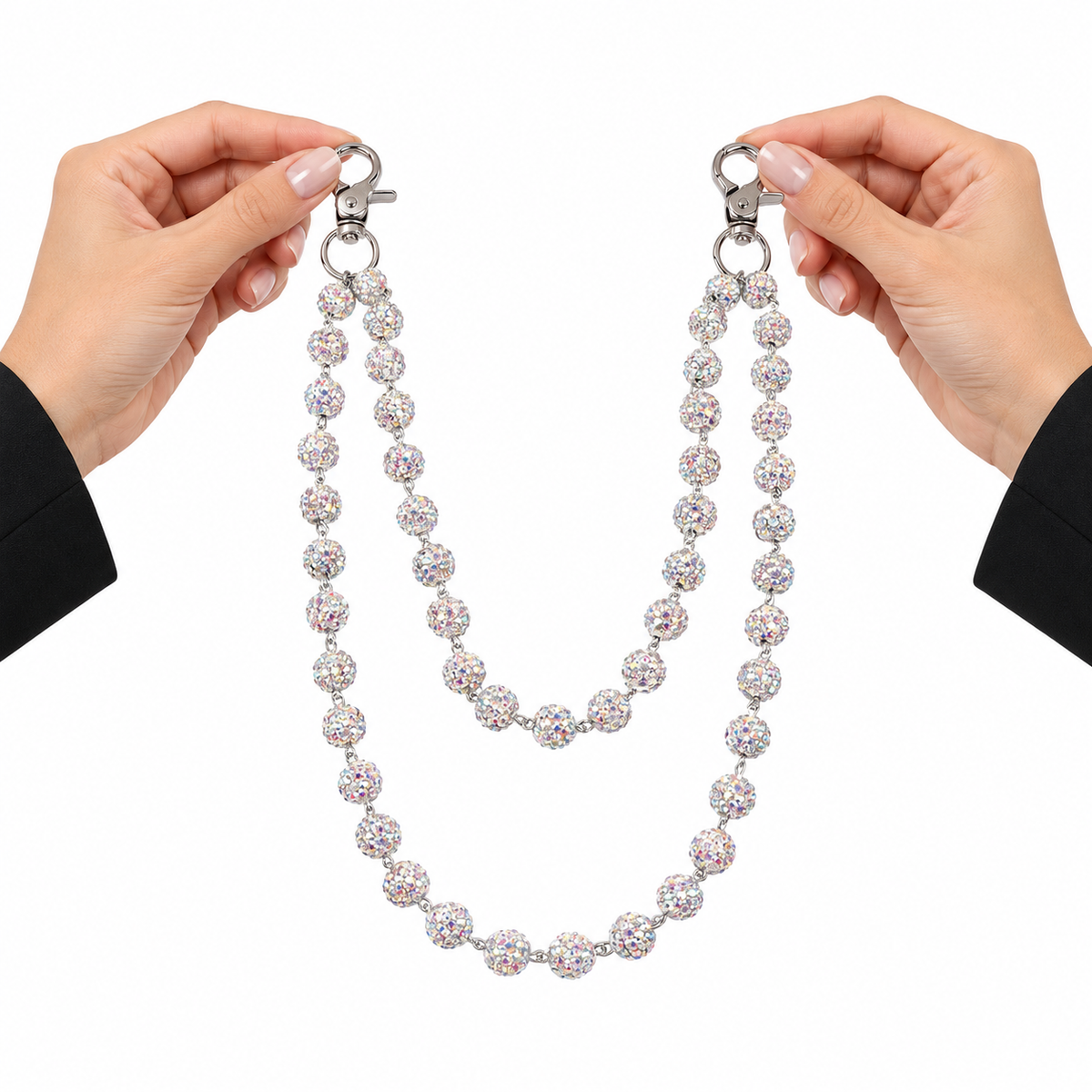 Prism iridescent beaded jean chain held by two hands for scale