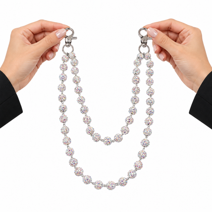 Prism iridescent beaded jean chain held by two hands for scale