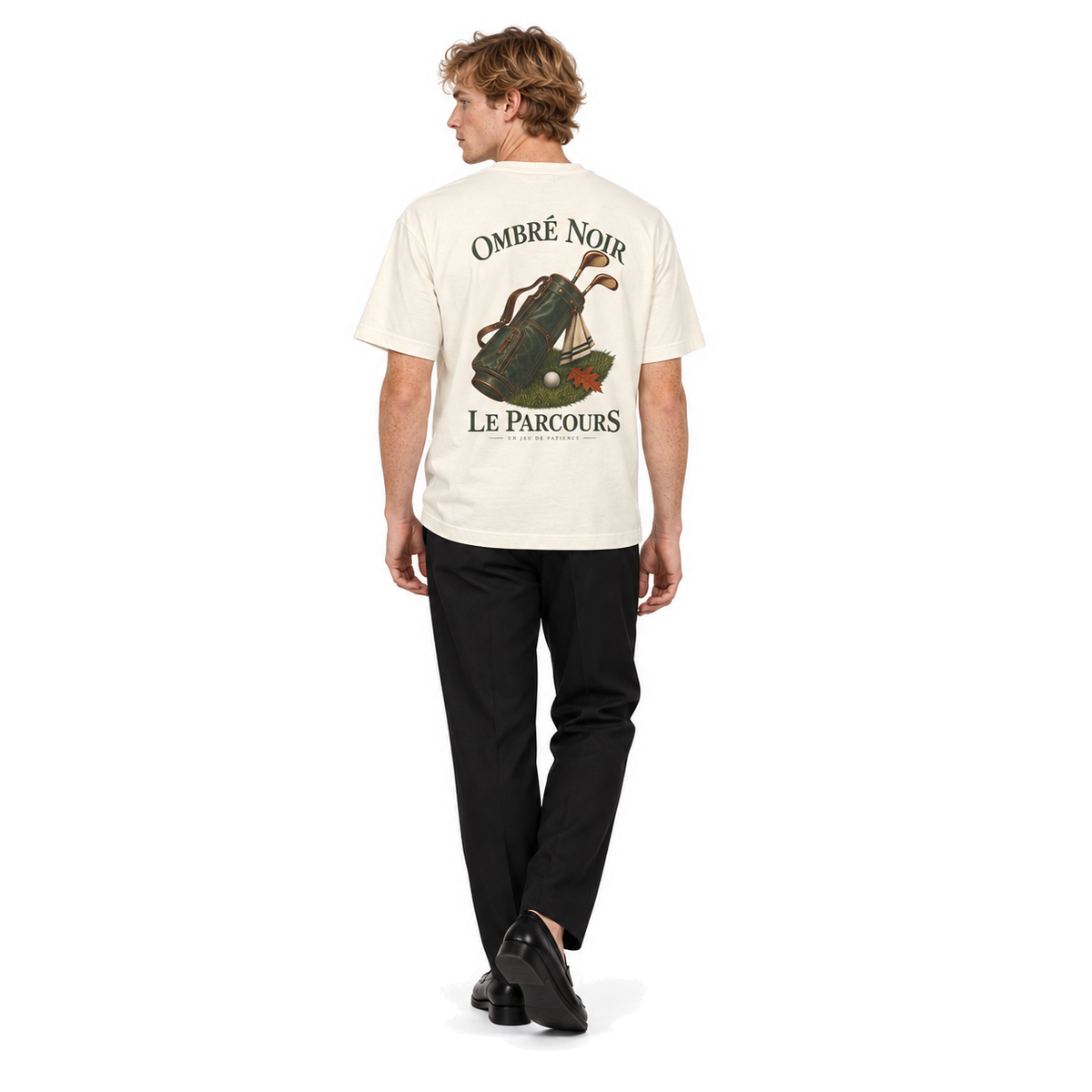 Male model wearing Le Parcours Graphic Tee in Faded Cream, back print visible