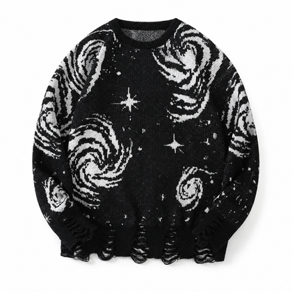 Close-up of Orbit Noir celestial knit pattern, ladder holes and frayed edge