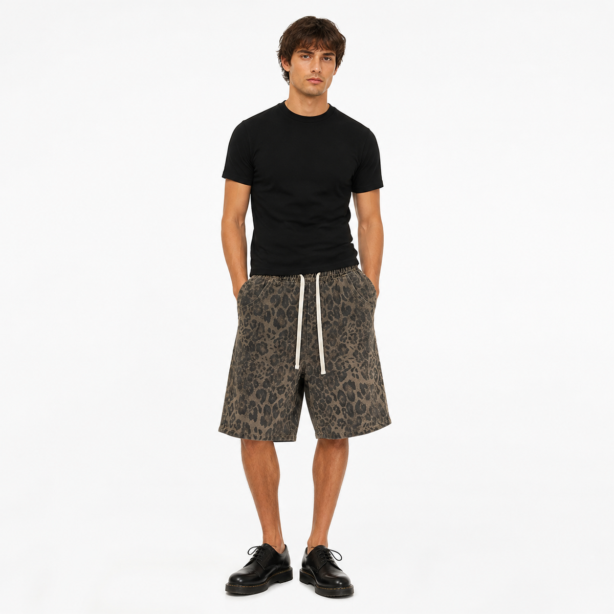 Model wearing Prowler loose leopard-print shorts