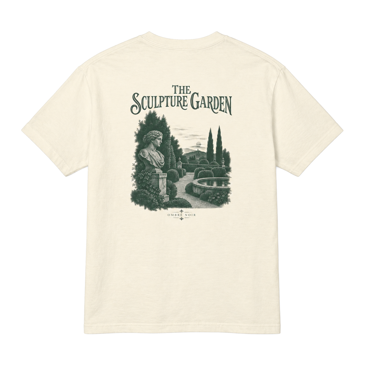 The Sculpture Garden Graphic Tee in Faded Cream, flat back view with green garden illustration