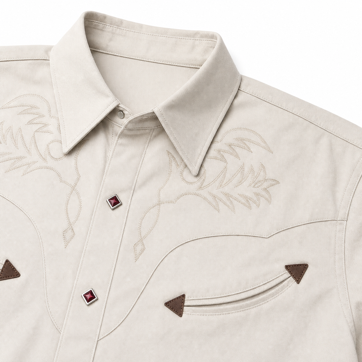 Close-up of Sonora Western shirt embroidery, pointed details and red diamond snaps