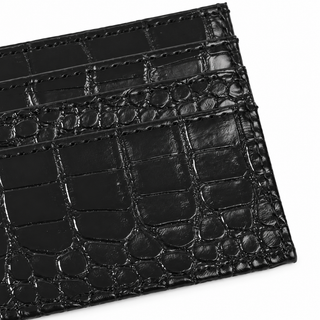 Tessera Croc Cardholder — Black, stitched front corner and card-slot edges close-up
