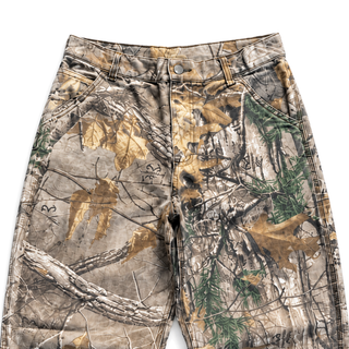 Underbrush Camo Wide-Leg Trousers in woodland camo, fabric and construction detail on white