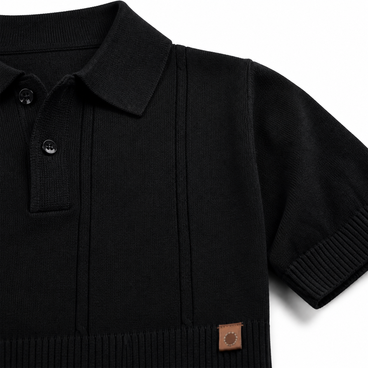 Close-up of Vesper Noir black ribbed knit and open polo collar