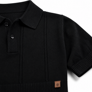 Close-up of Vesper Noir black ribbed knit and open polo collar